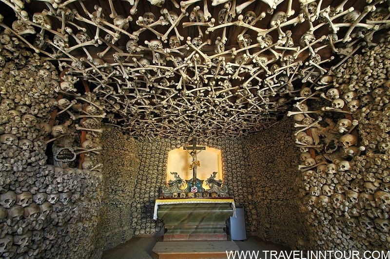 interior featuring human bones and remains on walls and ceiling